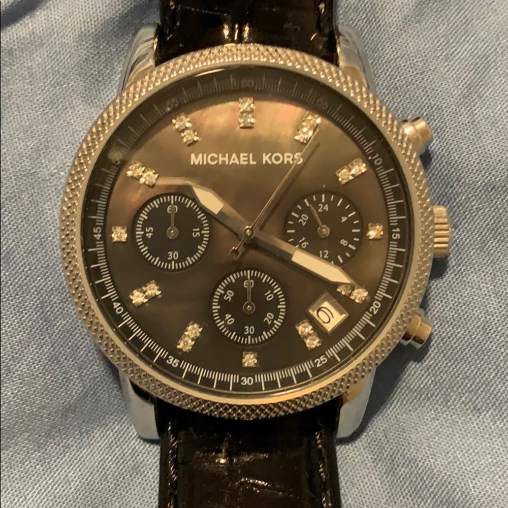 Used Michael kors watch no stains in back